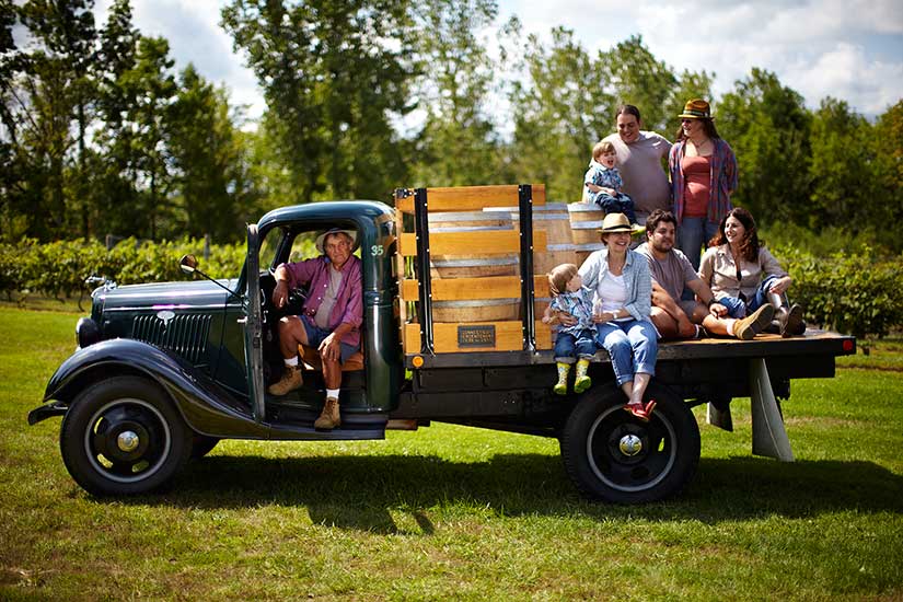Photo of family on a truck.